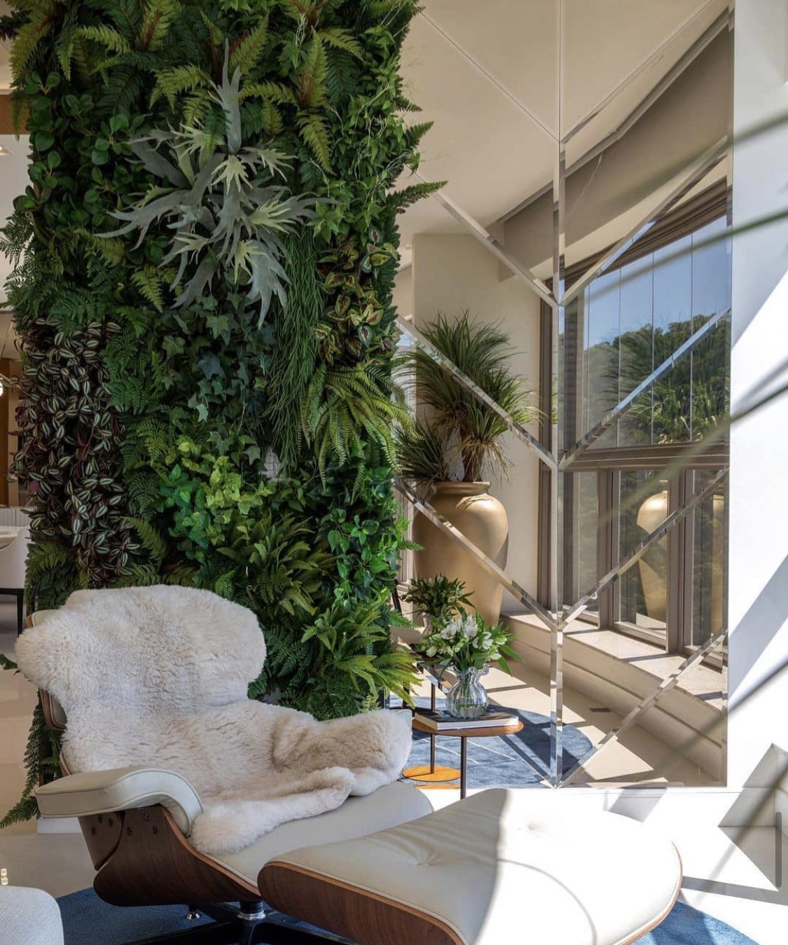 A beautifully crafted artificial green wall featuring lush greenery, stylish decorative elements, and a modern aesthetic, designed by Fairy Tale Green Walls in Limassol, Cyprus.